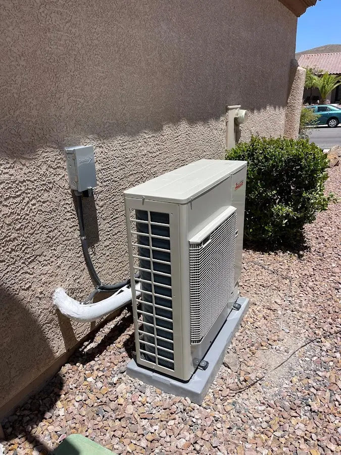 Residential air conditioning condenser unit in Grosse Ile
